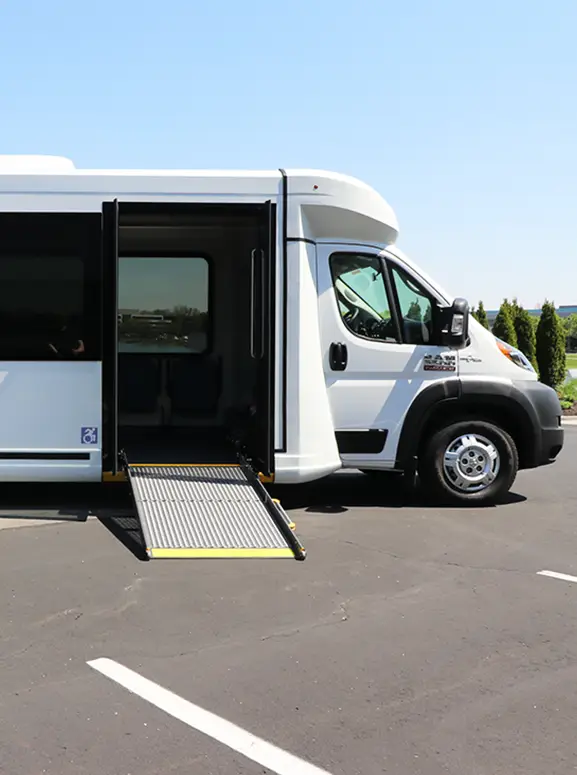 Handicap accessible vehicles in Duncan white wheelchair accessible bus