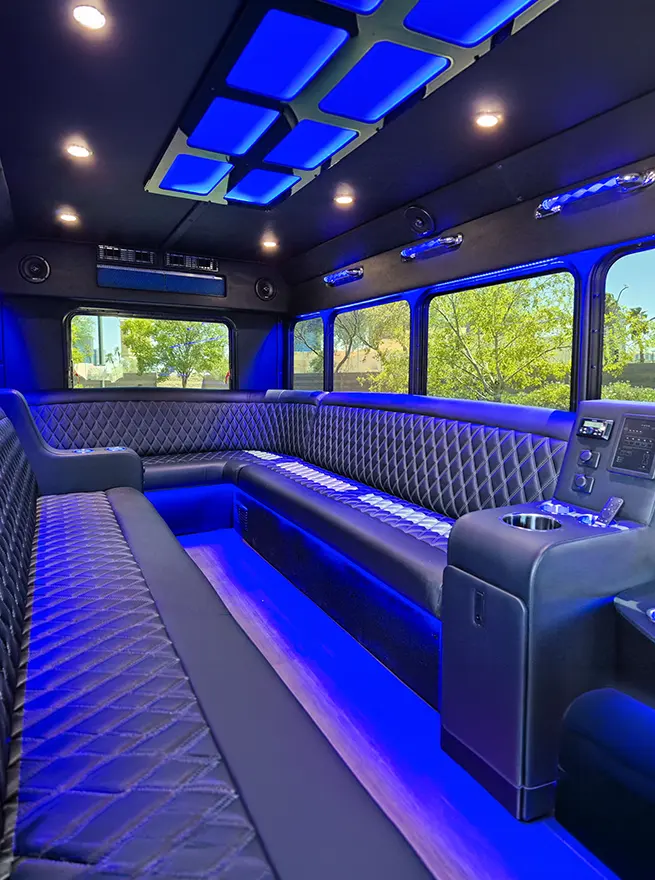 limo bus interior with blue lighting and luxury seating