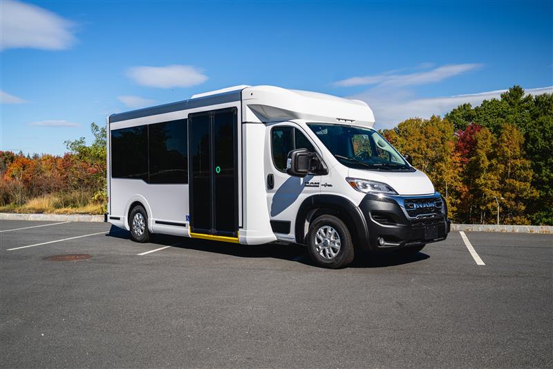 Exterior view of a commercial minibus used for shuttle and passenger transportation.