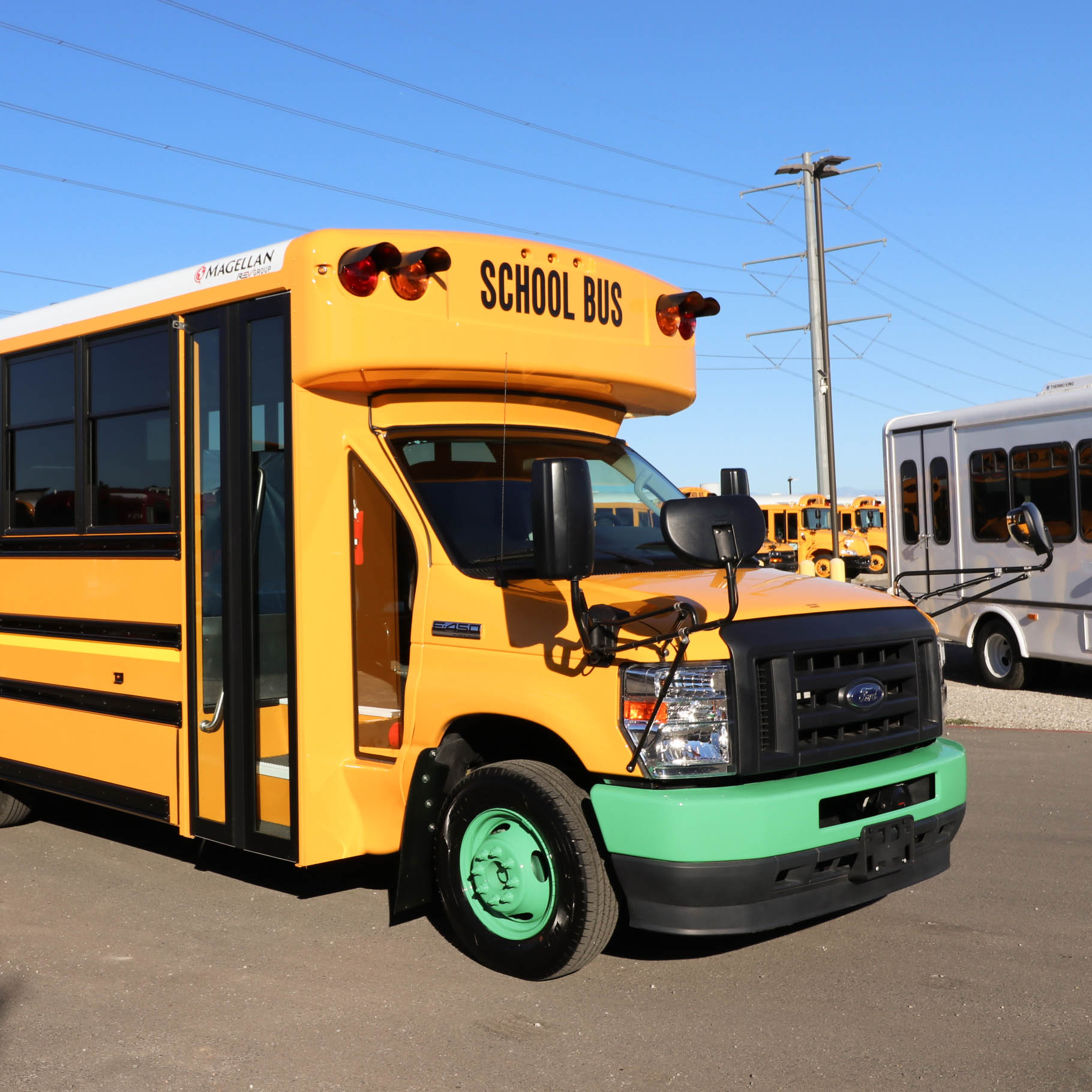 A yellow electric school bus.