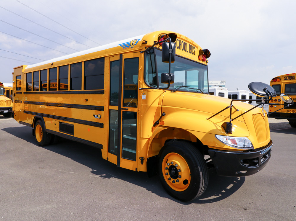 A yellow school bus parked in a parking lot