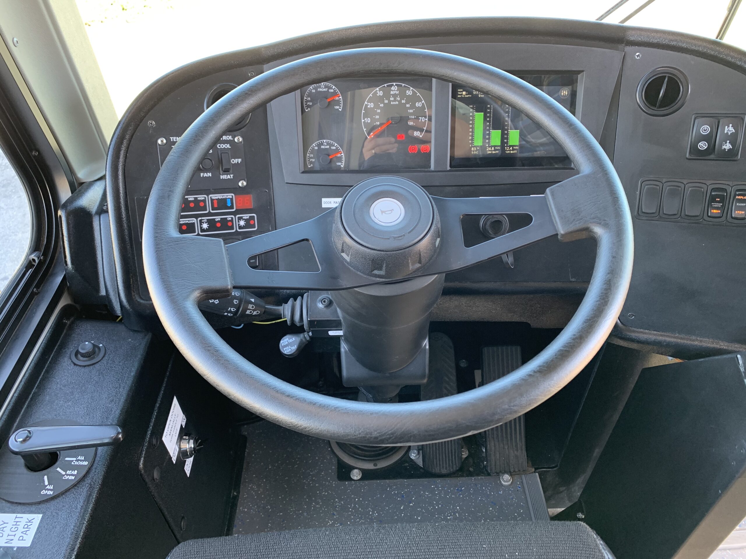 The dashboard and steering wheel of a 2021 ARBOC Equess CHARGE bus.