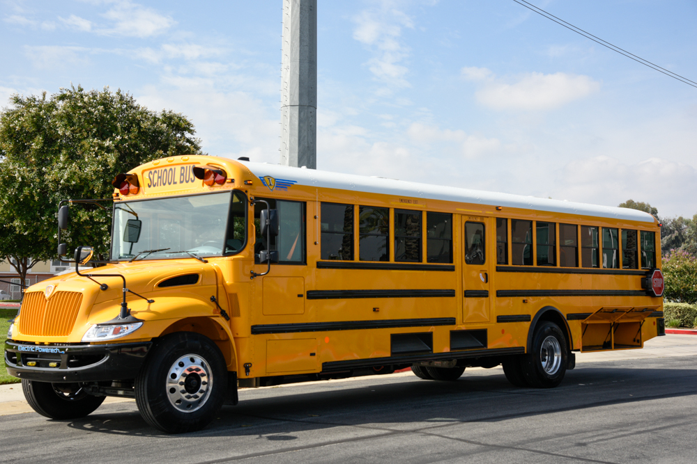 School bus in a parking lot passenger side