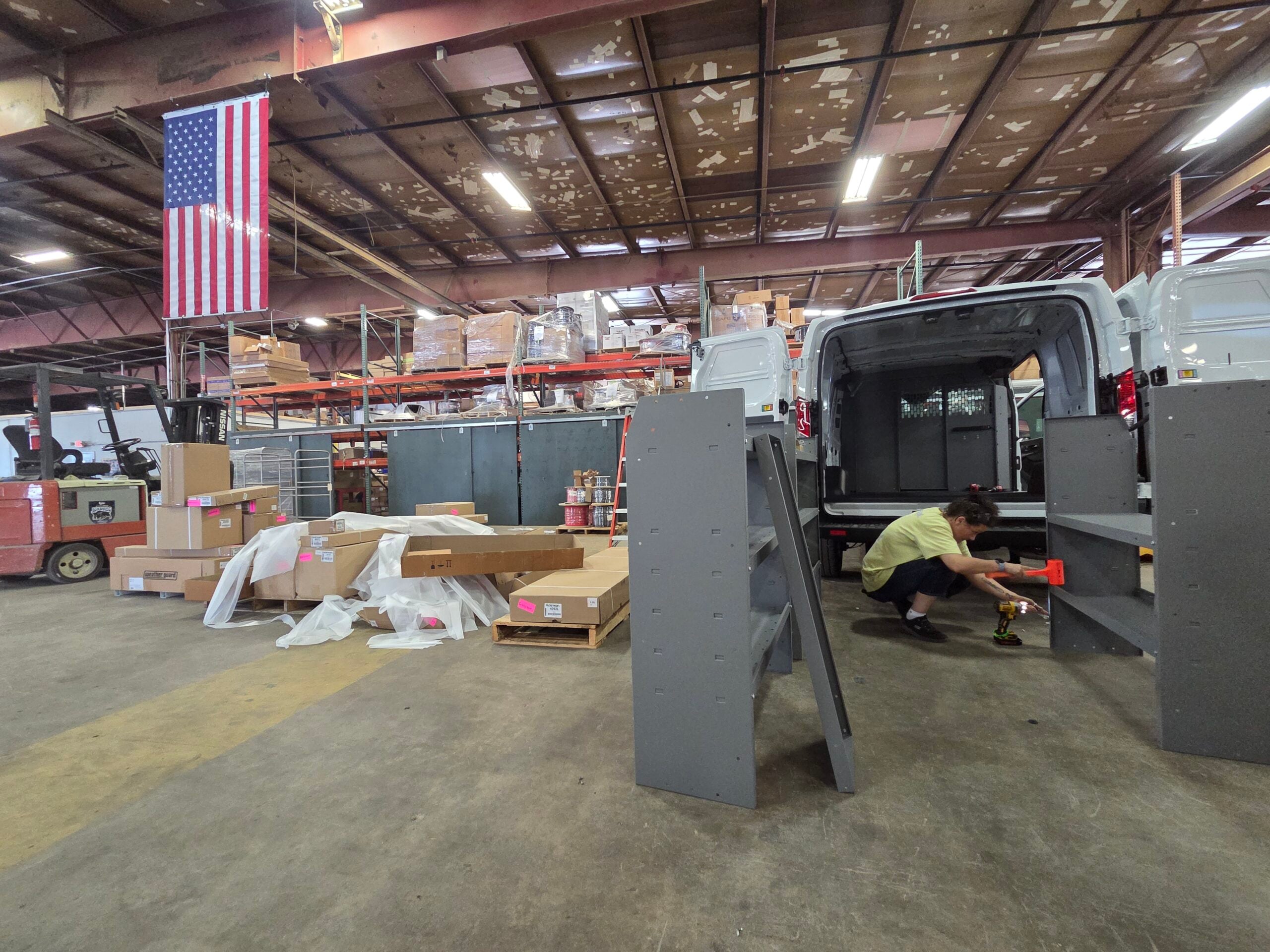 A cargo van is upfit at a Model 1 facility in the United States.