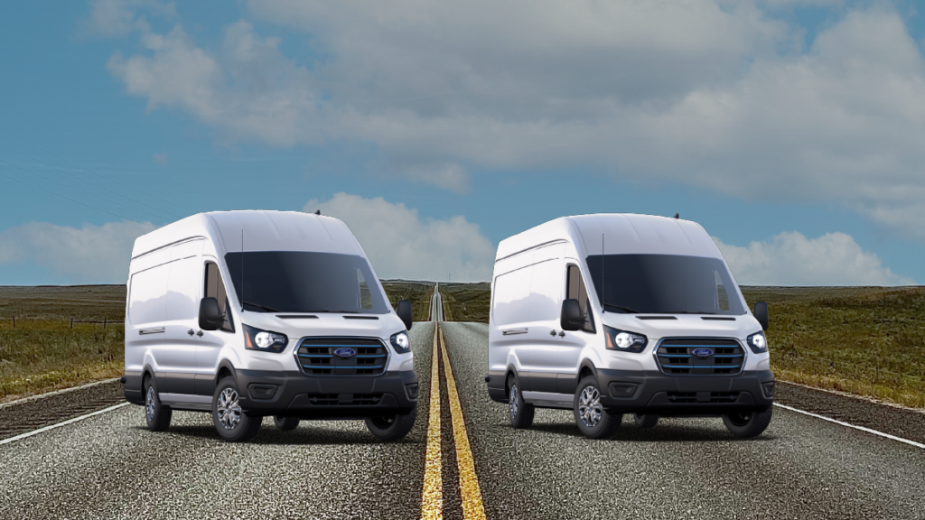 One rental and one purchased vehicle on a road.